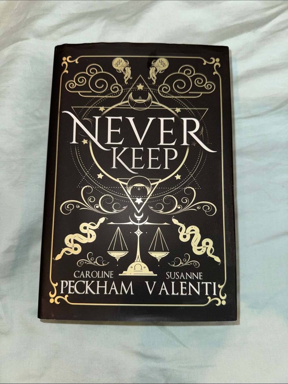 Never Keep: Sins of the Zodiac Hardcover Decorative Coffee Table Book - Black